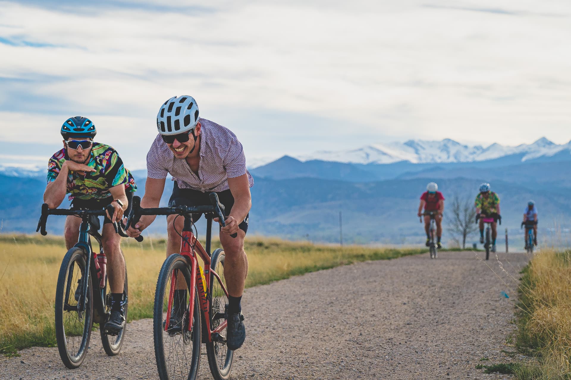 Two TGIF riders riding along a mountain ridge