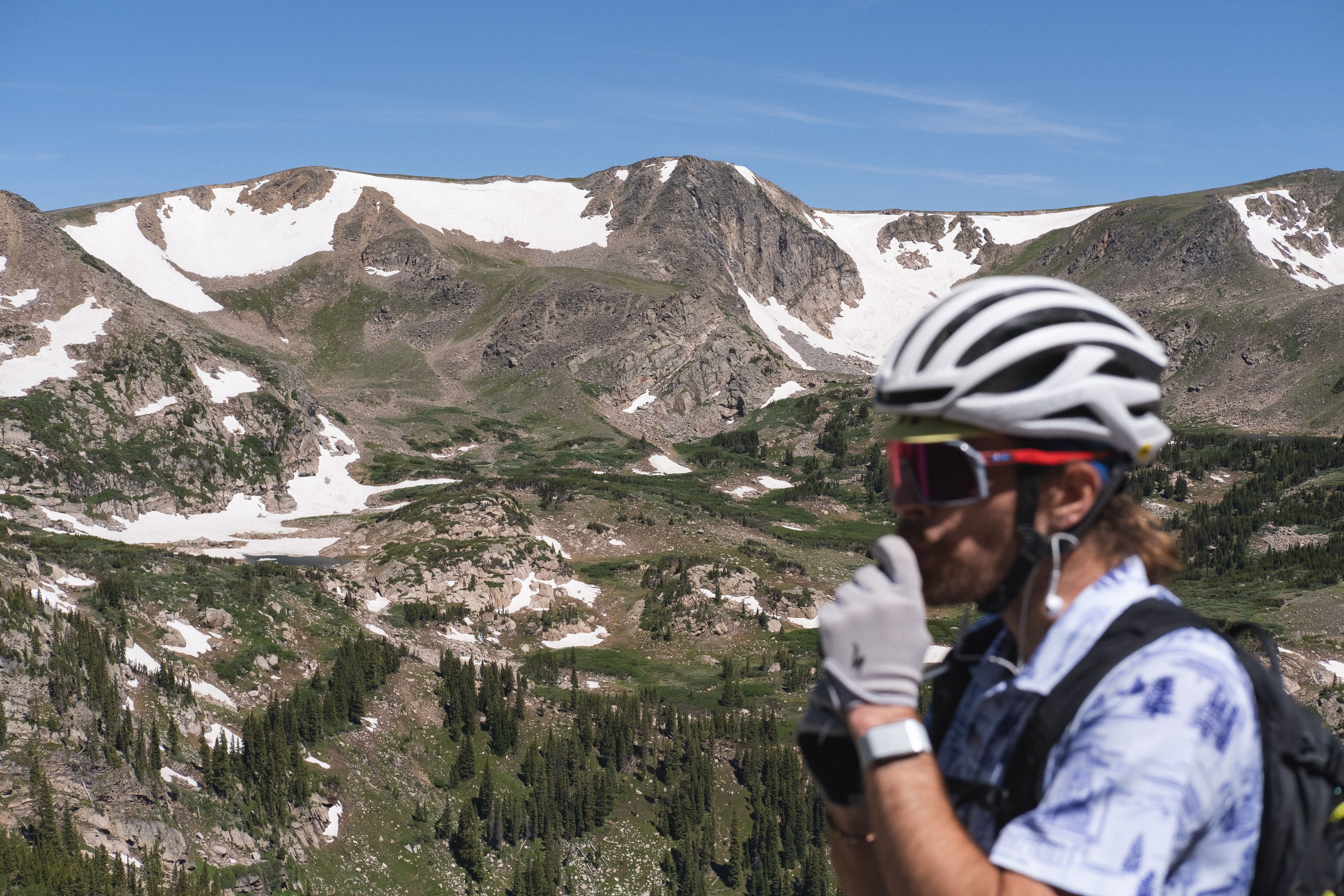 A TGIF rider with mountain peaks behind