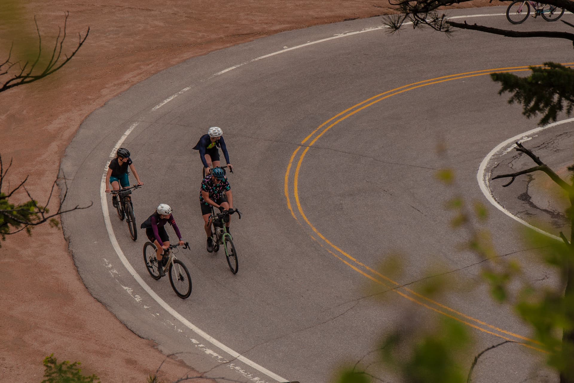 A Far Out rider on a mountain switchback