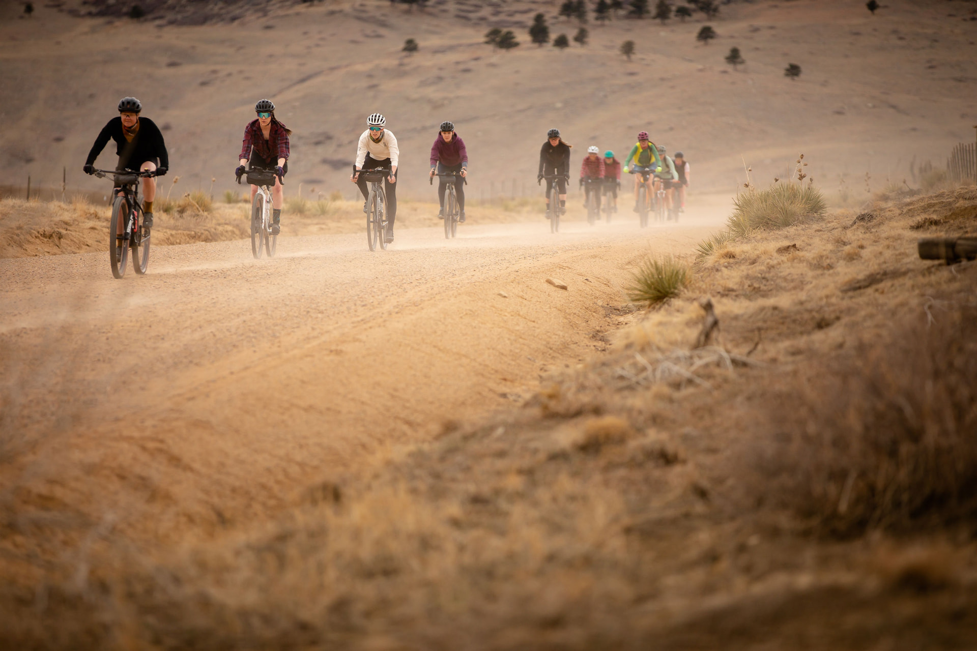 TGIF riders tracing a line through the dust