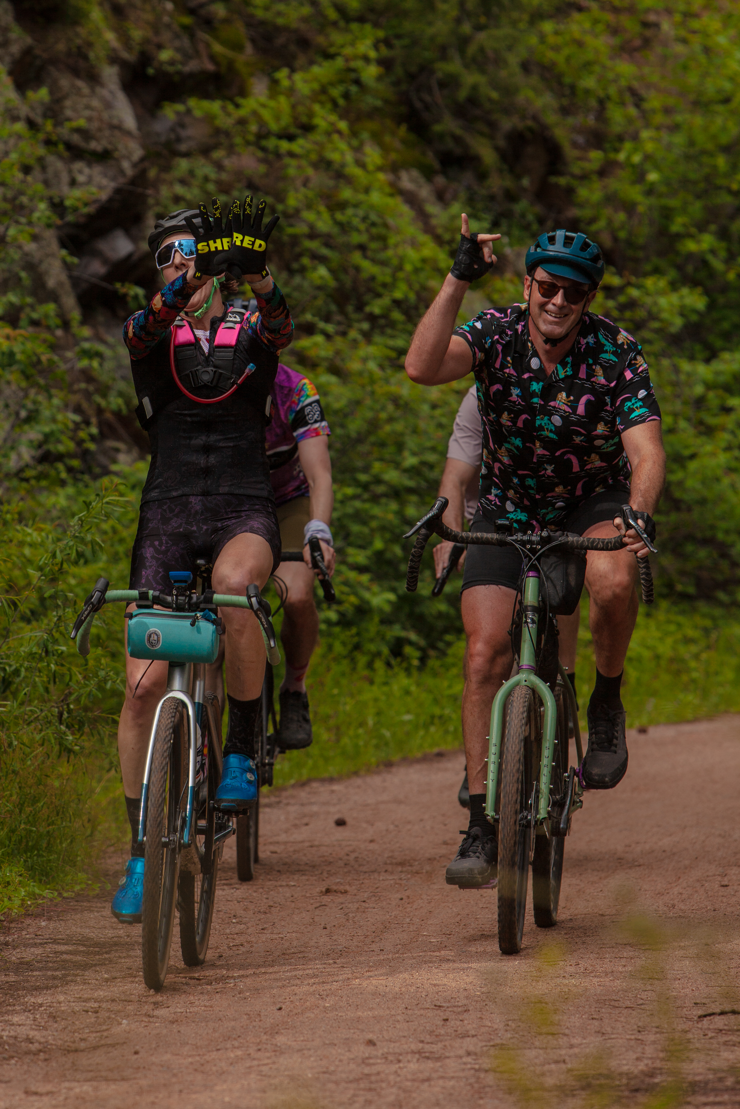 Two riders climbing during Far Out
