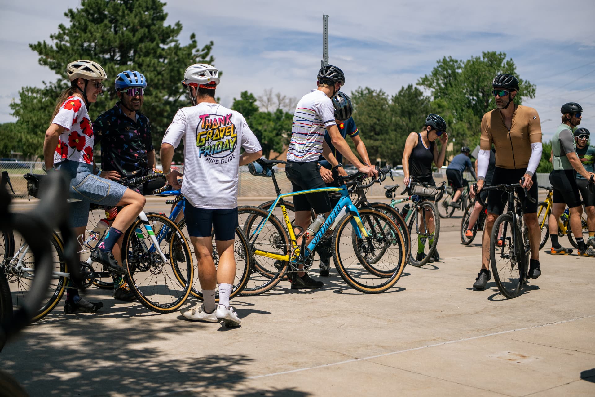 TGIF riders gathering beside their bikes